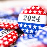 Campaign buttons with red, white and blue, stars and 2024