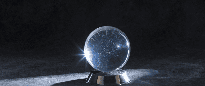 a crystal ball in a dark room, but glowing in spots to illustrate Signifyd's fraud prediction blog post